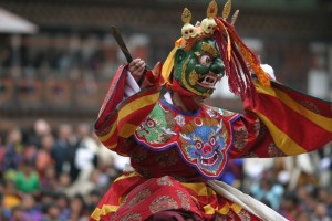 A traditional dancer at the Punakha Festival in Bhutan.