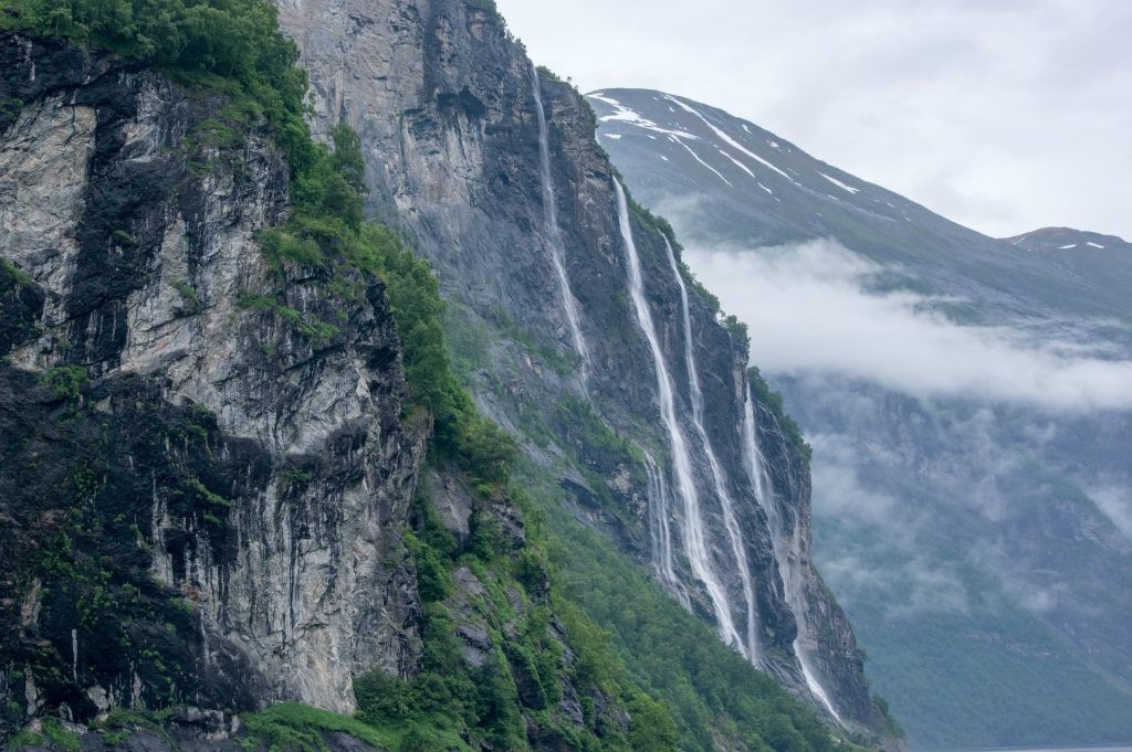 Waterfalls down a mountain near Geirangerfjord
