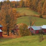 Red barns and a fall landscape in Vermont