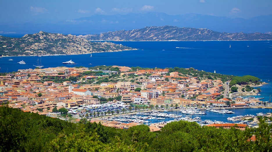 Aerial view of Olbia, Sardinia, Italy, with with prominent terra cotta rooftops and blue ocean