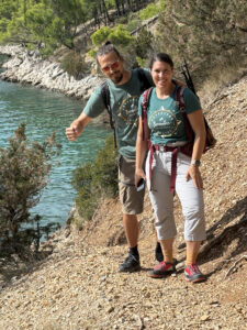 Domen and Tanja, Boundless Journeys guides, standing together on a trail