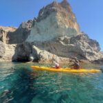 Image of two kayakers in Greece crystal waters