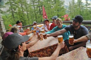 Photo of hikers sharing a toast after a hike along Mont Blanc