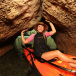 Photo of woman kayaking in Lost Lake Palau caves