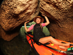 Photo of woman kayaking in Lost Lake Palau caves