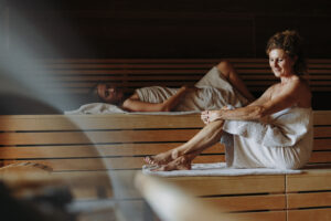 Sauna with two women relaxing in the Alps image